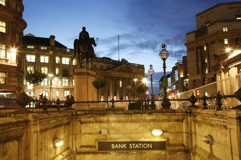 Bank tube station entrance at dusk 